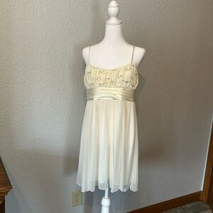 City Triangles Dress- Prom, Formal, Wedding 
Size L
Color cream w/gold sequins